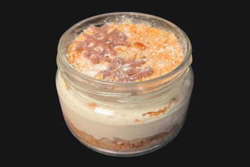 Homemade honey-flavored cake in a jar